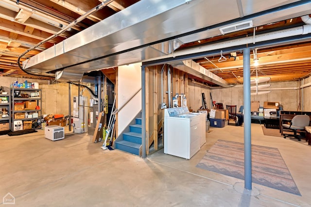 basement featuring washer / clothes dryer and gas water heater