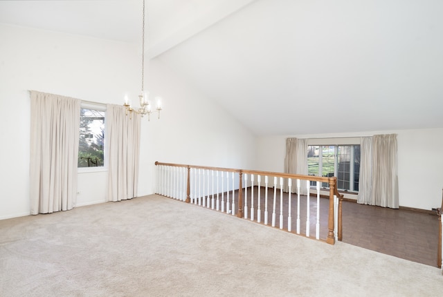 additional living space with carpet flooring, a chandelier, and vaulted ceiling