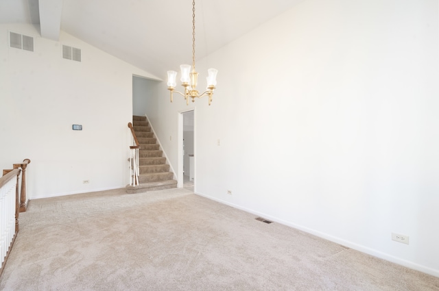 carpeted empty room with vaulted ceiling with beams and a chandelier