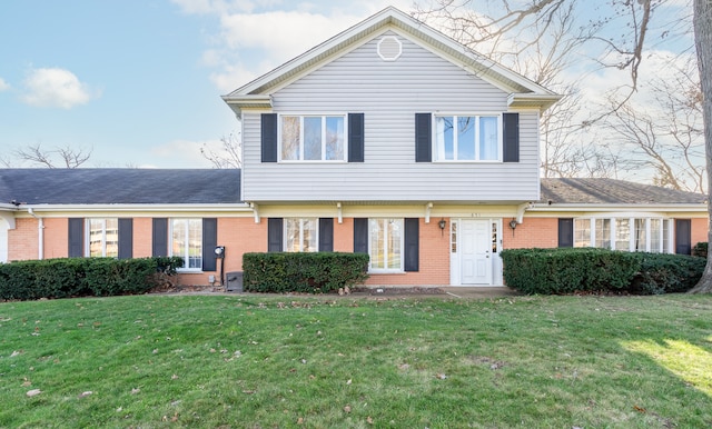 view of front property with a front lawn