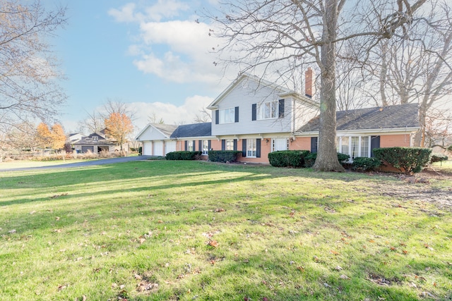 view of front of home with a front yard