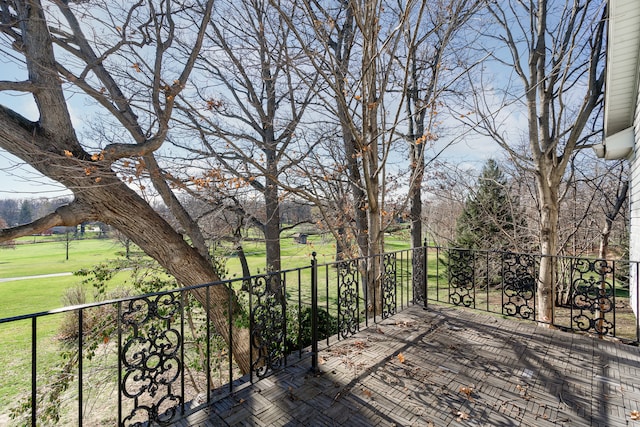 deck featuring a lawn