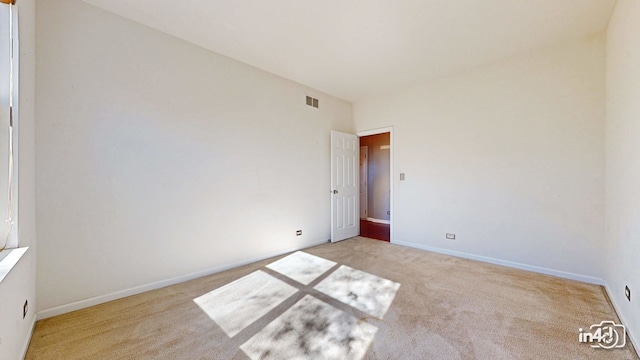 view of carpeted spare room