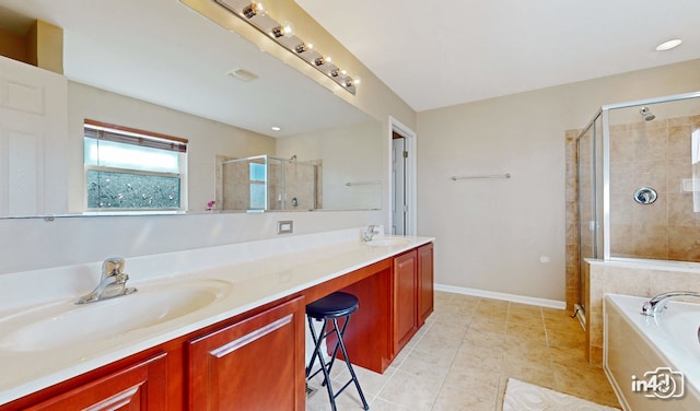 bathroom featuring vanity, independent shower and bath, and tile patterned flooring