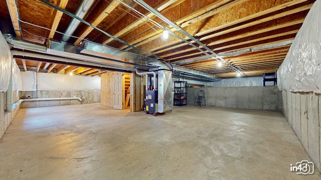 basement featuring heating unit