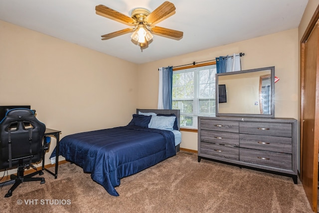 bedroom featuring carpet flooring, ceiling fan, and a closet