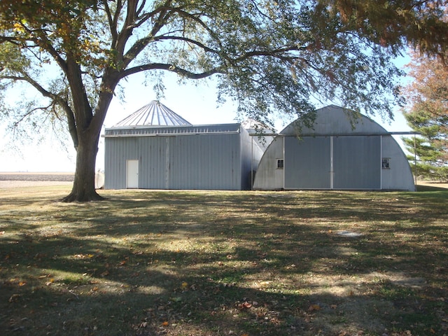 exterior space with a yard