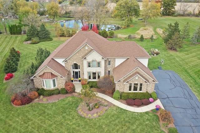 aerial view featuring a water view