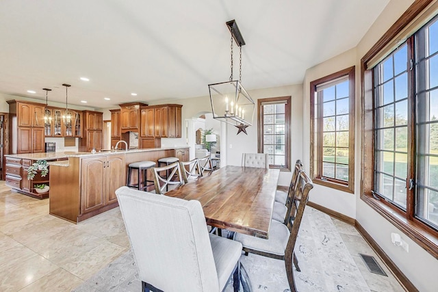 dining room featuring a chandelier