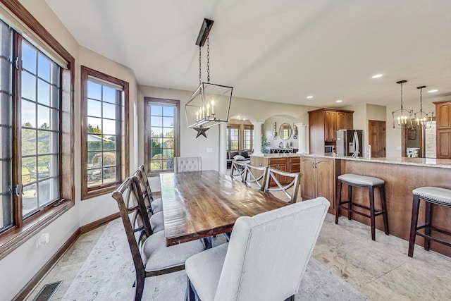 dining room with a chandelier