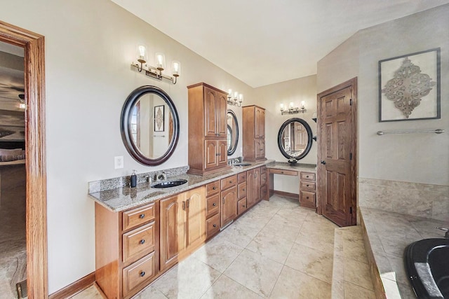 bathroom featuring a bathtub and vanity