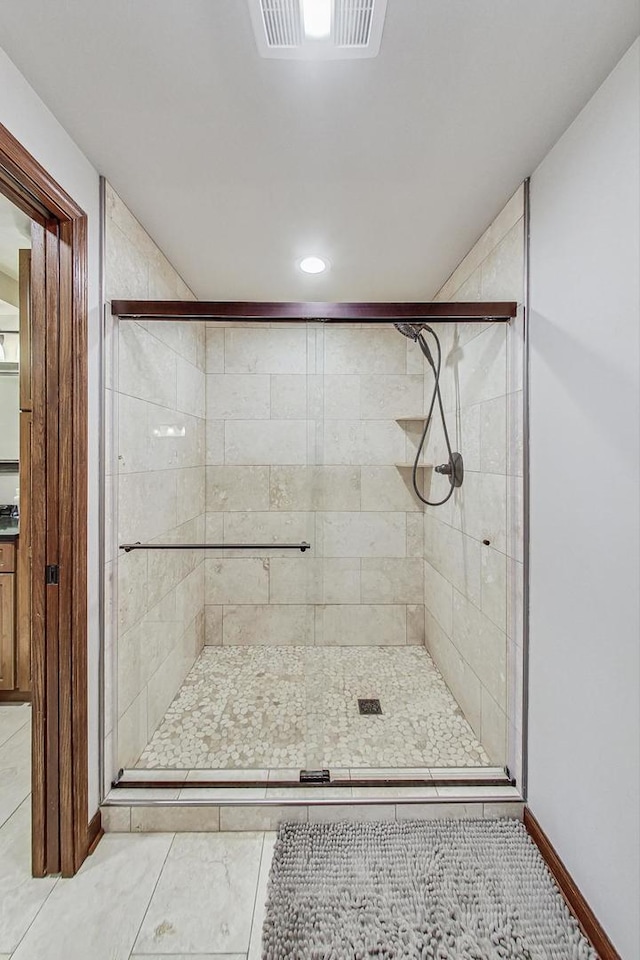 bathroom with an enclosed shower