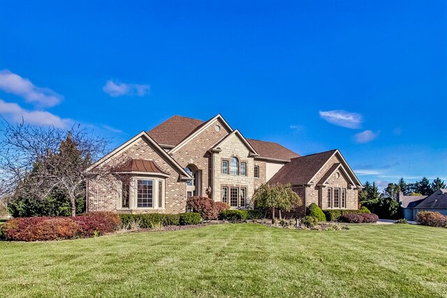 view of front of home with a front yard