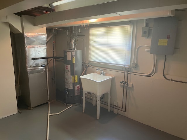 basement with water heater, electric panel, and heating unit