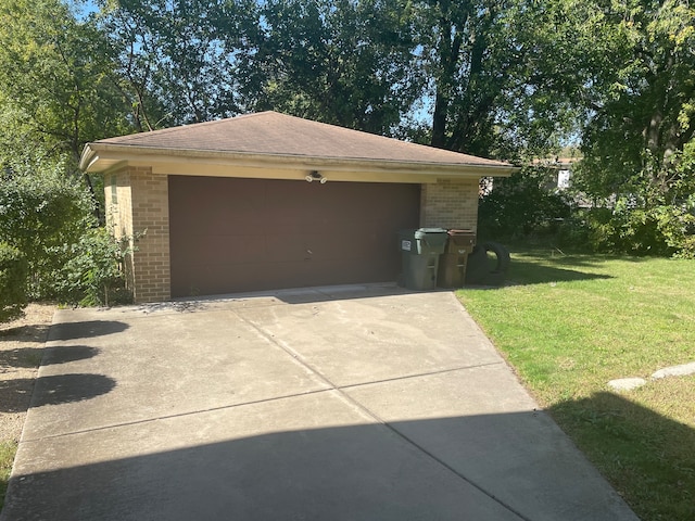 garage with a lawn