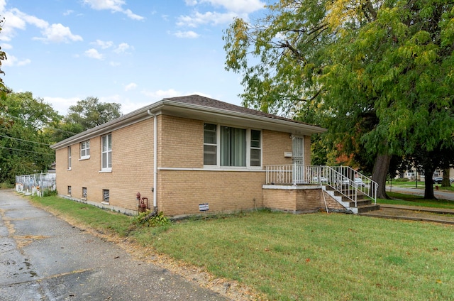 view of property exterior featuring a lawn