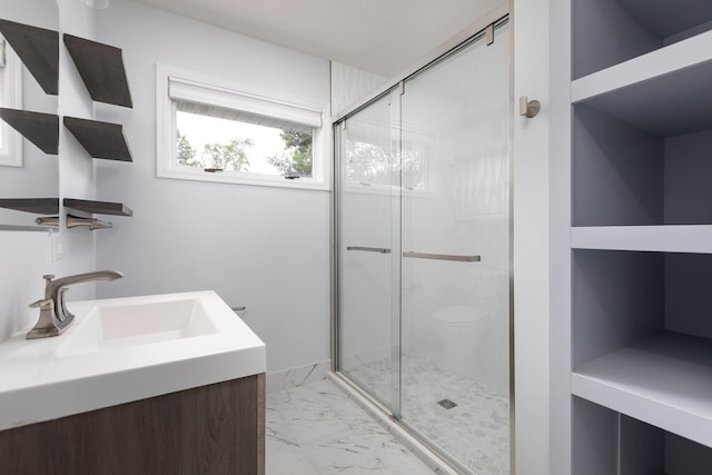 bathroom with vanity and walk in shower