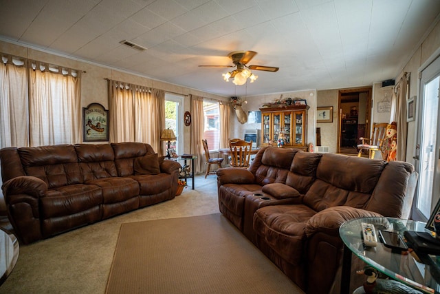 4140 E German Valley Rd, Freeport, IL 61032 - living room featuring carpet, a ceiling fan, and ornamental molding