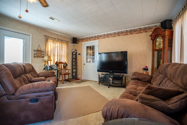 living room featuring ceiling fan and carpet floors