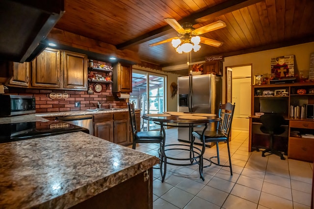 kitchen with wood ceiling, light tile patterned floors, ventilation hood, backsplash, and appliances with stainless steel finishes