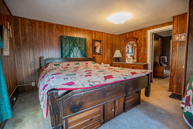 carpeted bedroom with wooden walls