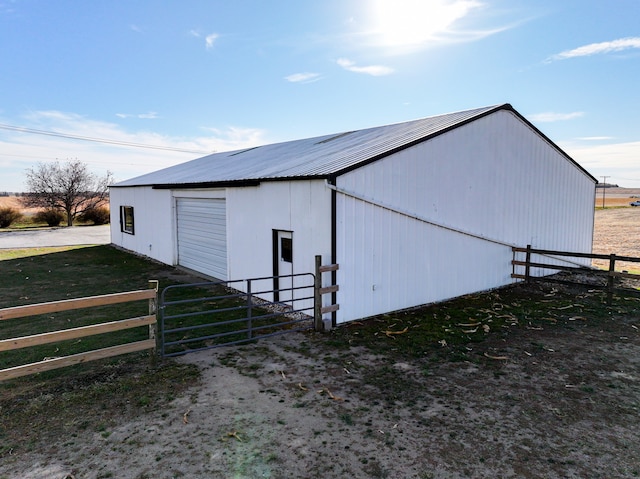 view of outdoor structure with a garage