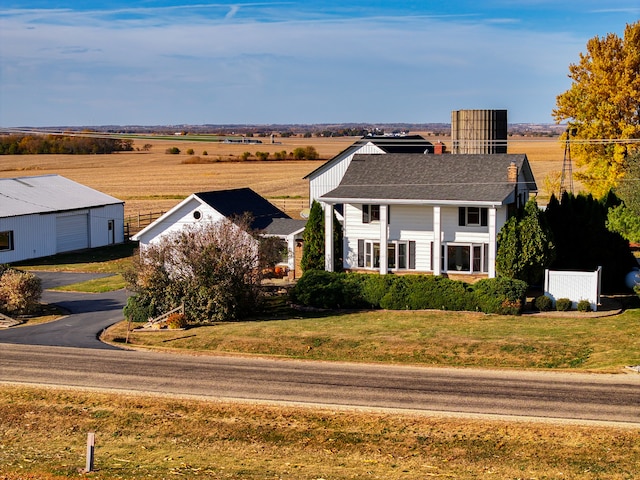 view of front of home featuring a rural view