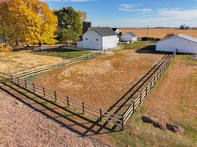 view of yard with a rural view