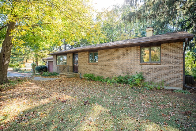 single story home with central air condition unit