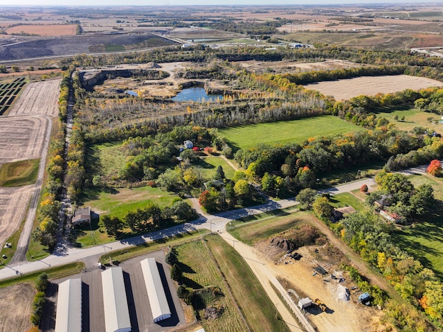 aerial view featuring a water view and a rural view