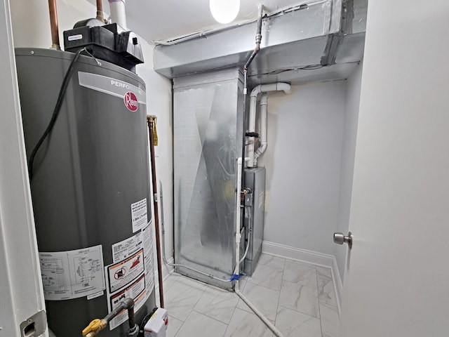 utility room with gas water heater