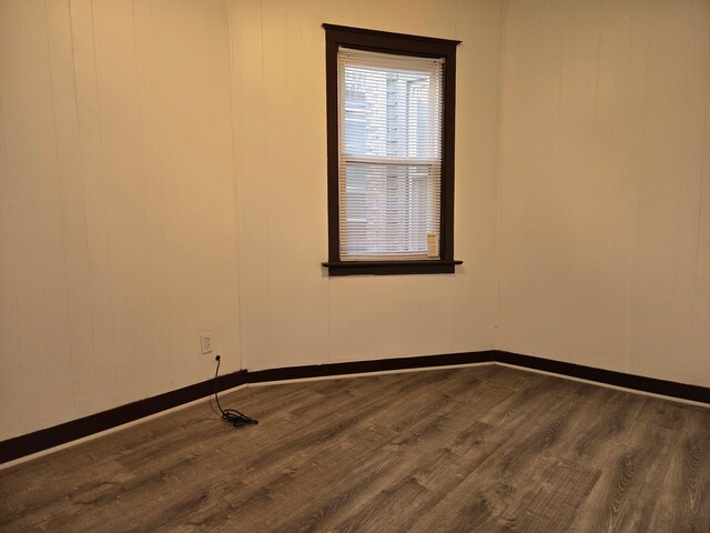 empty room featuring hardwood / wood-style floors