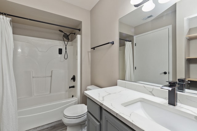 full bathroom with toilet, shower / tub combo, vanity, and hardwood / wood-style floors