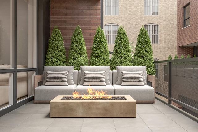 exterior space with a patio area and an outdoor fire pit