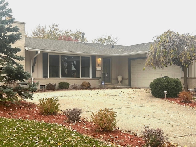 single story home with a garage