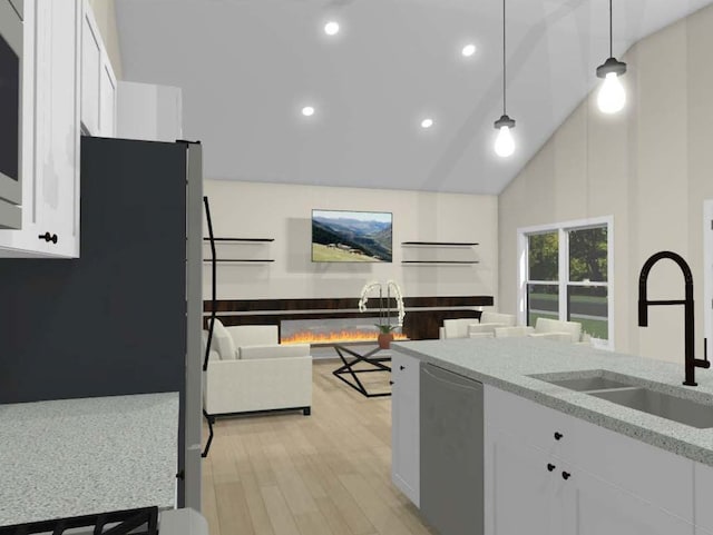 kitchen with light stone counters, white cabinetry, high vaulted ceiling, pendant lighting, and sink