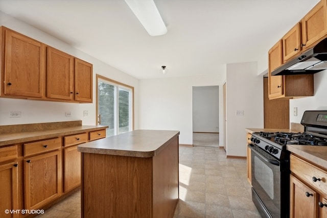 kitchen with black range with gas cooktop and a center island