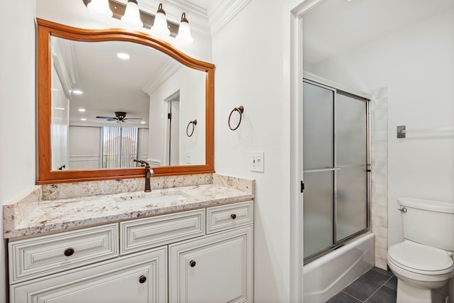 full bathroom with toilet, tile patterned flooring, ornamental molding, vanity, and ceiling fan