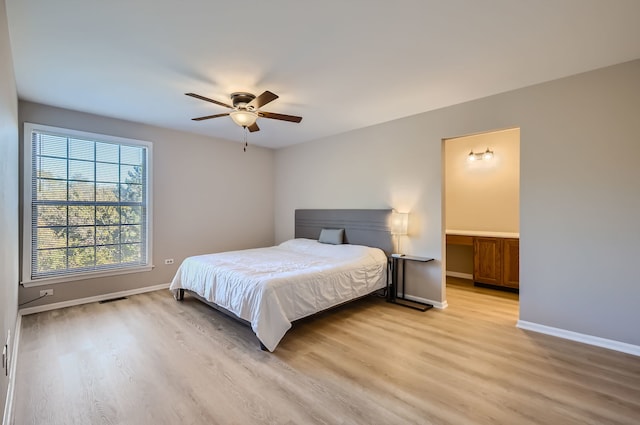 bedroom featuring ceiling fan and light hardwood / wood-style flooring