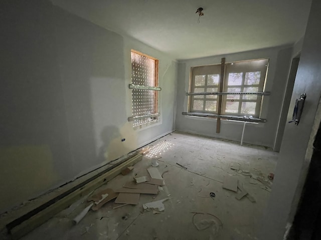 spare room featuring plenty of natural light