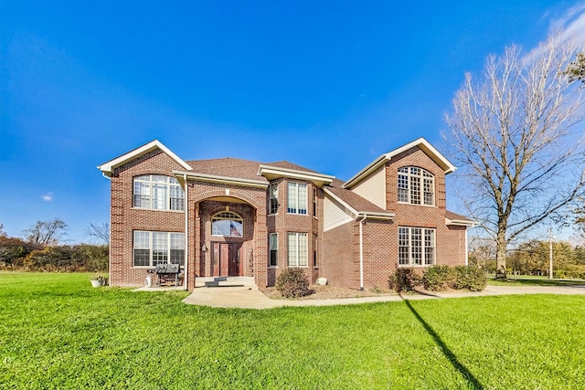 front facade featuring a front lawn