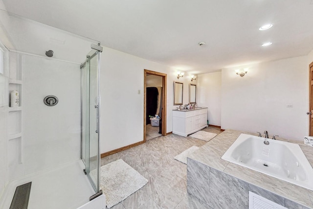 bathroom featuring plus walk in shower and vanity