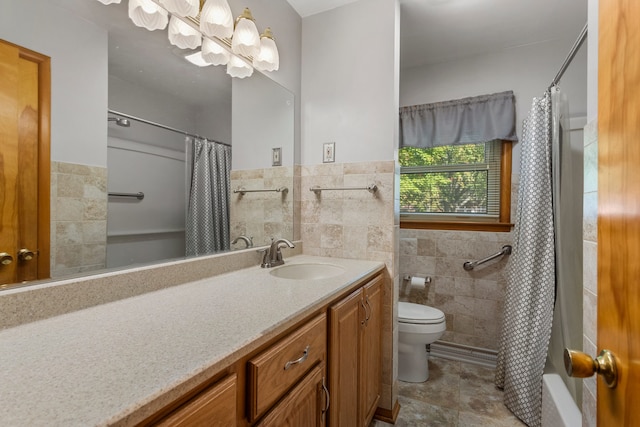 full bathroom featuring tile walls, vanity, shower / bath combination with curtain, and toilet