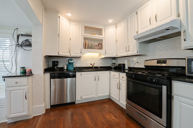 kitchen with sink, dark wood-type flooring, white cabinetry, and stainless steel appliances