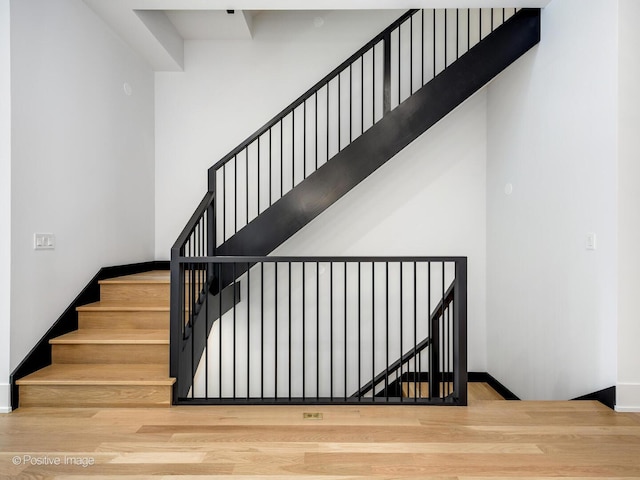 2118 N Clifton Ave, Chicago, IL 60614 - stairway with baseboards and wood finished floors
