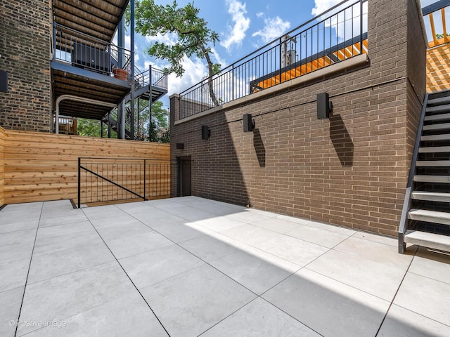 2118 N Clifton Ave, Chicago, IL 60614 - view of patio with fence and stairway