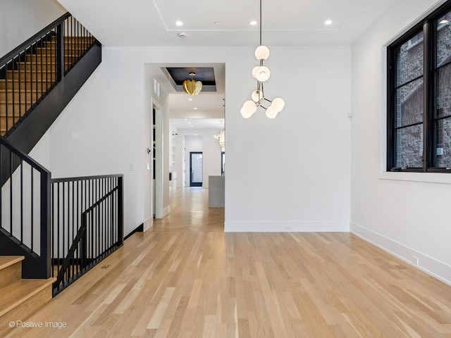 2118 N Clifton Ave, Chicago, IL 60614 - interior space featuring an inviting chandelier, baseboards, stairs, and wood finished floors