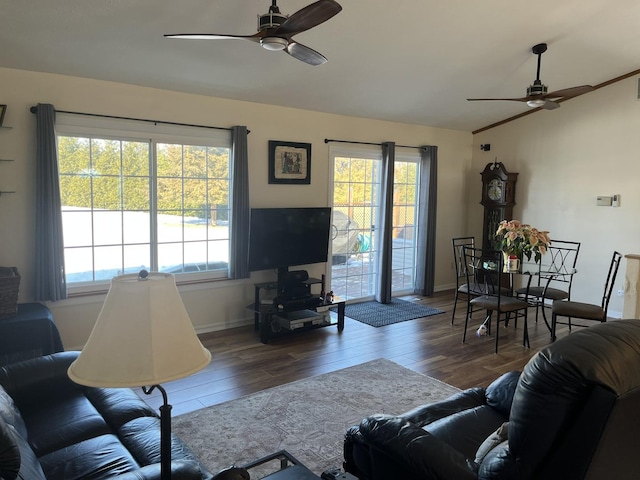 living room featuring ceiling fan, lofted ceiling, hardwood / wood-style floors, and a wealth of natural light