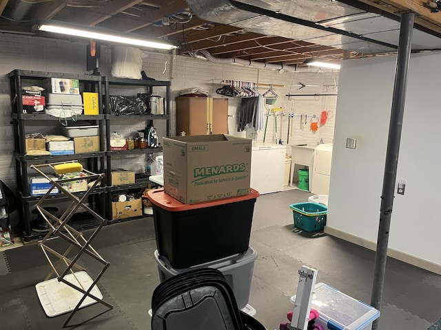 storage room featuring washing machine and dryer