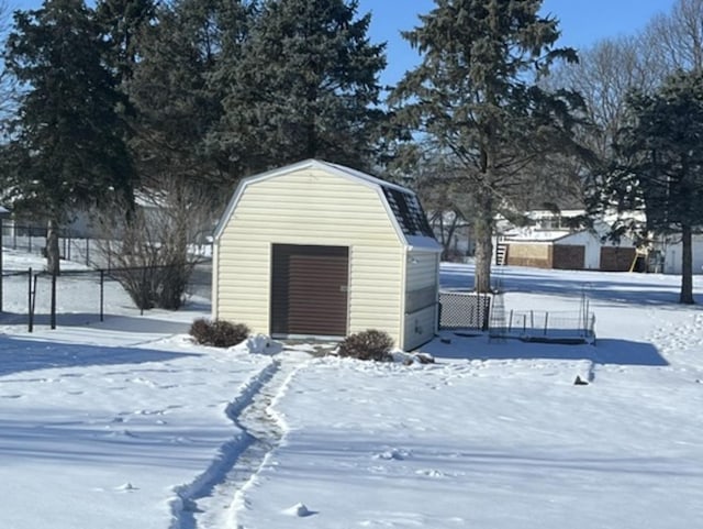 view of snow covered garage